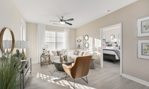 a living room with a couch and a chair