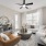 ceiling fan and light fixture in beautifully furnished living room