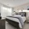 wide window in furnished bedroom