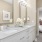 master bathroom with double sink and mirrors